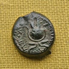 Bronze coin with Zeus Ammon/Isis ornament on the head